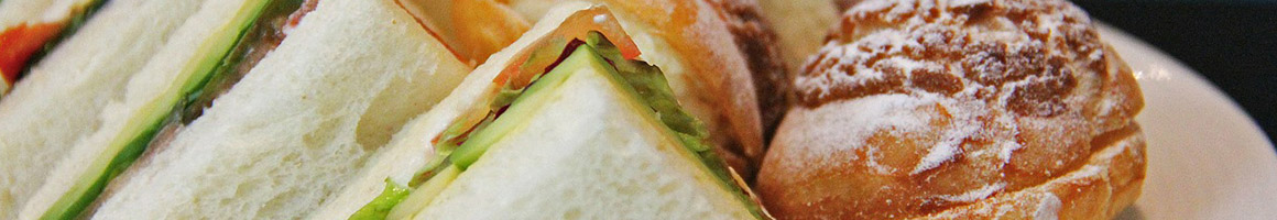 Eating Sandwich Cheesesteak at Yellow Submarine restaurant in Maple Shade, NJ.